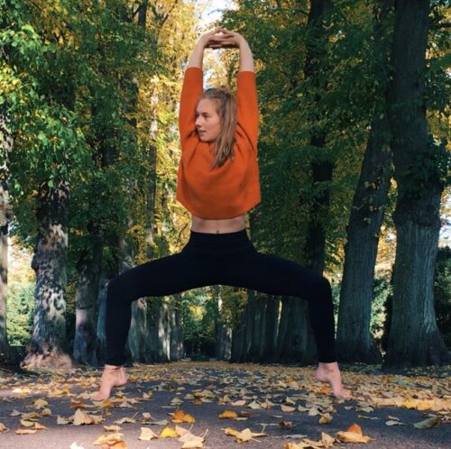 Camilla doing yoga as part of her journey on how to set goals and stick to them