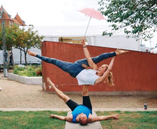 An acroyoga pose with passive flexibility splits
