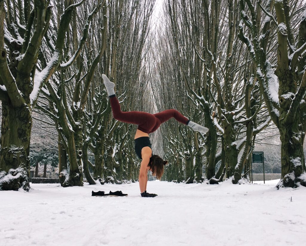 A fun handstand in the snow with little thought to alignment