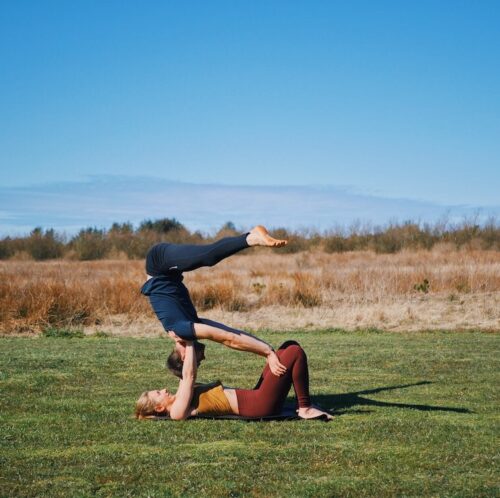 Two athletes performing duo acroyoga poses Stock Photo by Photology75, duo  yoga poses - thirstymag.com