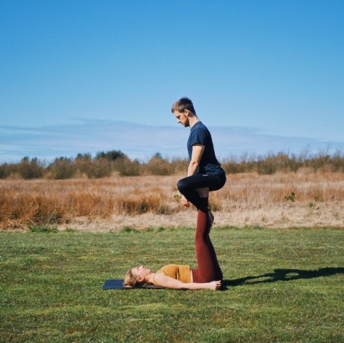 Throne pose from acroyoga, which is one of the beginner friendly acroyoga poses