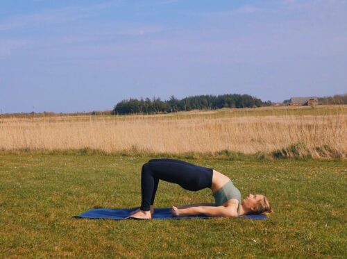 A yoga hip + spine stretch to prepare for wheel pose